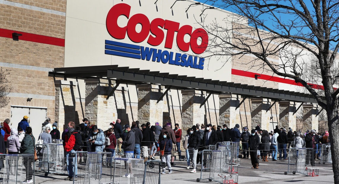 People wait to shop at the Costco Wholesale in Austin on Feb. 20.