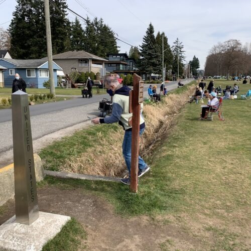 Crossing the border into Peace Arch State Park from Canada, at left, entails stepping across a ditch. CREDIT: Tom Banse/N3