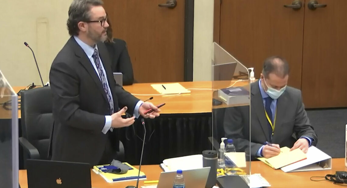 Defense attorney Eric Nelson (left) with his client, former Minneapolis police officer Derek Chauvin, on Monday. Chauvin is on trial for murder in the death of George Floyd in police custody in May 2020. AP