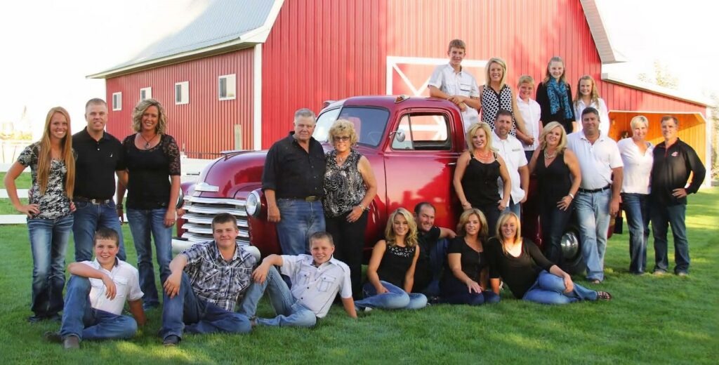 The Easterday family, shown in this photo publicly available on the Easterday company website and in a company promotional video publicly available on the website. Cody Easterday is standing at left with a black shirt. Family patriarch Gale Easterday, who died in December 2020 in a vehicle collision with one of his company's trucks, is standing in the center.
