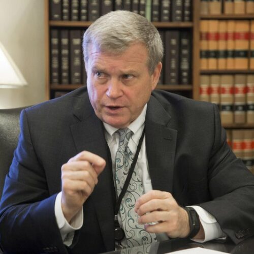 File photo. Idaho Attorney General Lawrence Wasden during a 2017 interview in Boise. GOP Idaho lawmakers frustrated with the Republican Idaho attorney general have put forward a series of bills that could significantly defund his office. Wasden irked lawmakers by not joining a Texas lawsuit to invalidate the presidential election. CREDIT: Darin Oswald/Idaho Statesman via AP