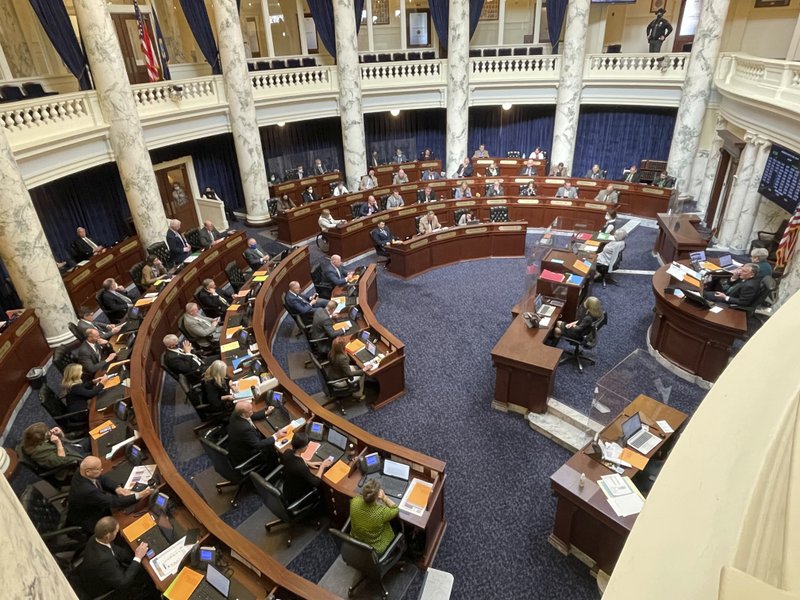 Lawmakers in the Idaho House of Representative debate a bill on Wednesday, March 17, 2021. They approved a massive income tax cut backers say provides much-needed relief but that opponents say is a giveaway to the rich that will result in long-lasting harm. CREDIT: Keith Ridler/AP