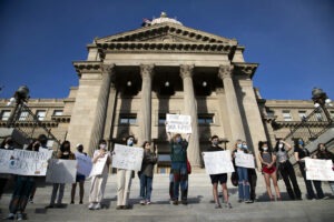 Student demonstrators stand on the steps of the Idaho Statehouse on Friday, March 5, 2021 in protest of Rep. Barbara Ehardt’s sex ed opt-in bill.