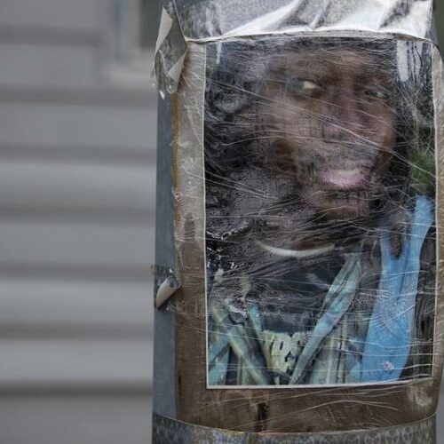 An image of Manuel "Manny" Ellis is taped to a utility pole on Thursday, June 4, 2020, near the intersection of Ainsworth Avenue South and 96th Street South in Tacoma. Ellis was killed by police on March 3rd, 2020