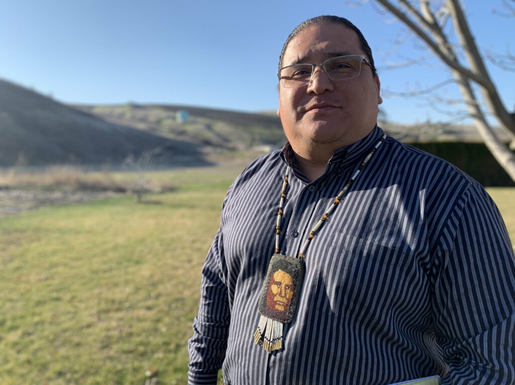 The Nez Perce tribe's vice chairman Casey Mitchell proudly wears a bead necklace sewn by his mother as a college graduation present that depicts Chief Joseph. CREDIT: Kirk Siegler/NPR