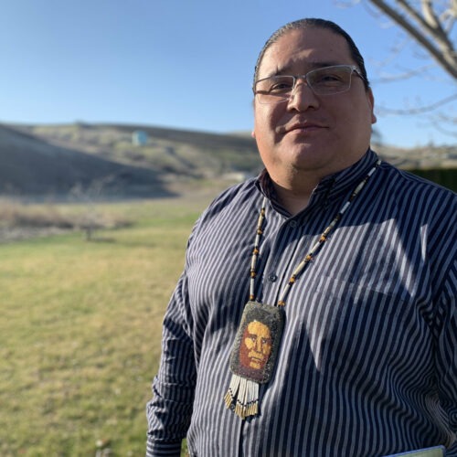 The Nez Perce tribe's vice chairman Casey Mitchell proudly wears a bead necklace sewn by his mother as a college graduation present that depicts Chief Joseph. CREDIT: Kirk Siegler/NPR