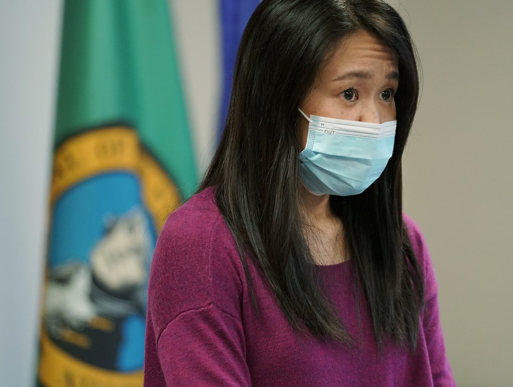 Noriko Nasu, a high school teacher who was attacked earlier in the year while walking through Seattle's Chinatown-International District, speaks about the possible hate crime Monday, March 22, 2021, at a news conference at Renton City Hall in Renton, Wash., south of Seattle. Nasu joined Washington Gov. Jay Inslee and other leaders Monday to denounce recent acts of violence and harassment targeted at Asians and Asian communities. CREDIT: Ted S. Warren/AP