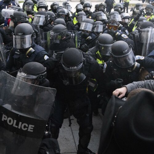 U.S. Capitol Police push back rioters trying to enter the U.S. Capitol in Washington on Jan. 6. CREDIT: Jose Luis Magana/AP
