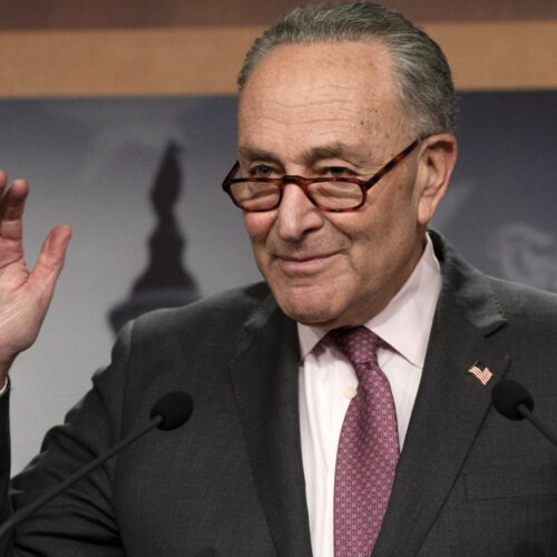 Senate Majority Leader Chuck Schumer, D-N.Y., is working to keep both moderates and progressives inside his caucus on board with the $1.9 trillion coronavirus relief bill and pass it this week. Jacquelyn Martin/AP