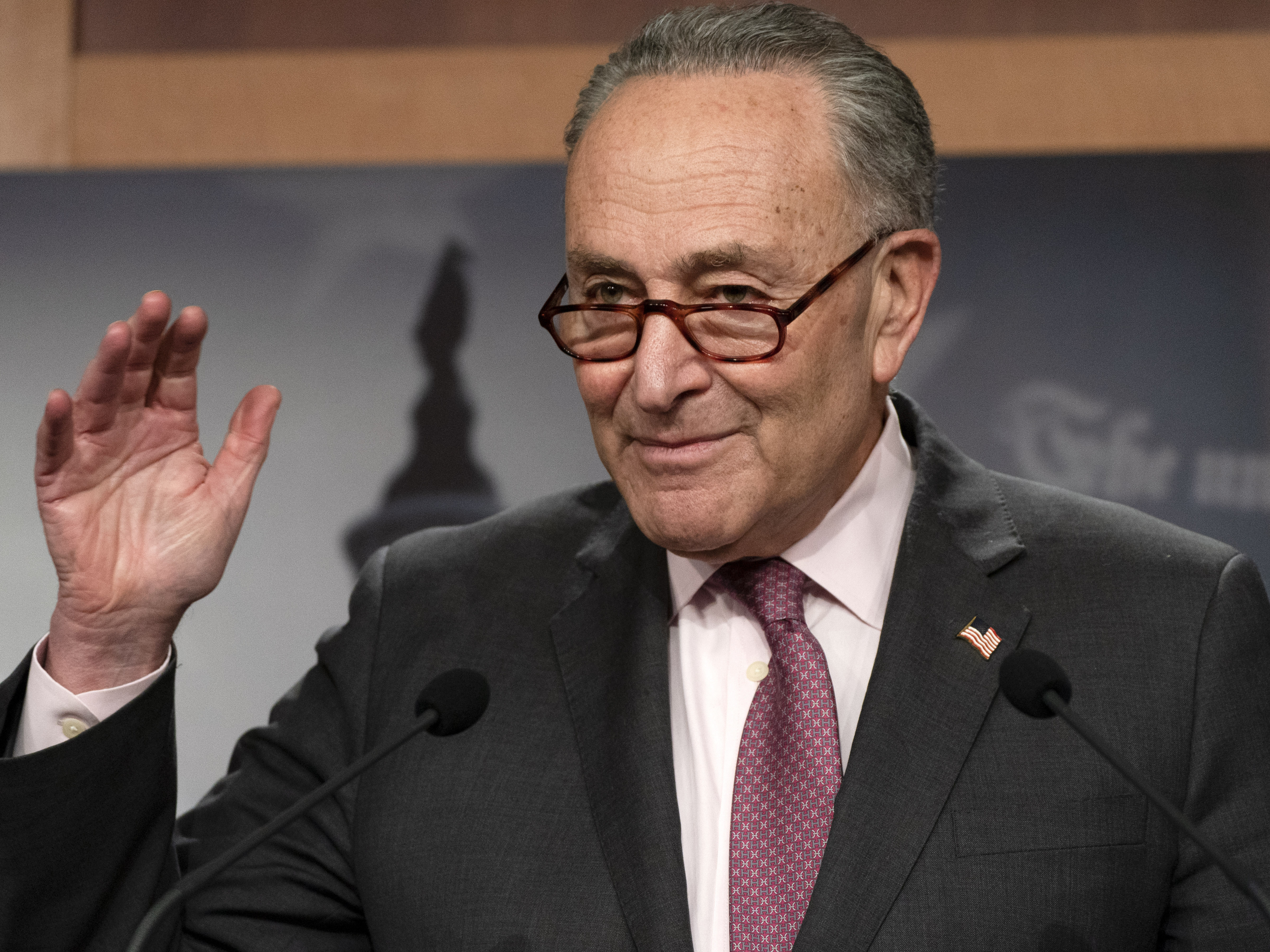 Senate Majority Leader Chuck Schumer, D-N.Y., is working to keep both moderates and progressives inside his caucus on board with the $1.9 trillion coronavirus relief bill and pass it this week. Jacquelyn Martin/AP