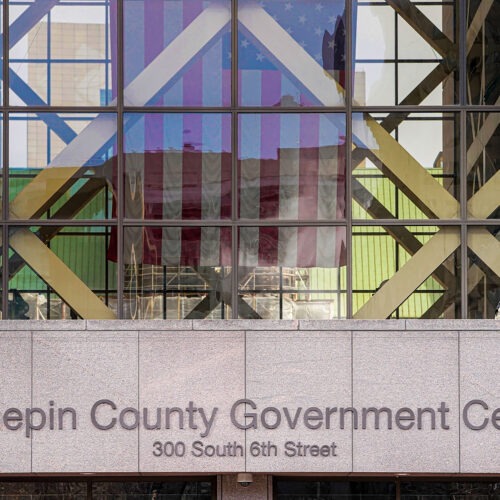 A member of the Minnesota National Guard stands outside the Hennepin County Government Center during jury selection in the trial of former Minneapolis police officer Derek Chauvin on March 11 in Minneapolis. Chauvin is facing murder charges in George Floyd's death. Among the 12 jurors and three alternates selected are three Black men, one Black woman and two multiracial jurors. CREDIT: Kerem Yucel/AFP via Getty Images