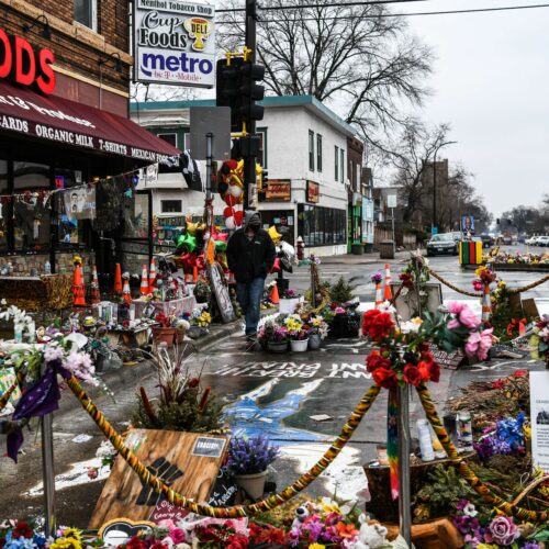 A makeshift memorial in Minneapolis honors George Floyd as jury selection begins in the trial of former police officer Derek Chauvin. CREDIT: Chandan Khanna/AFP via Getty Images