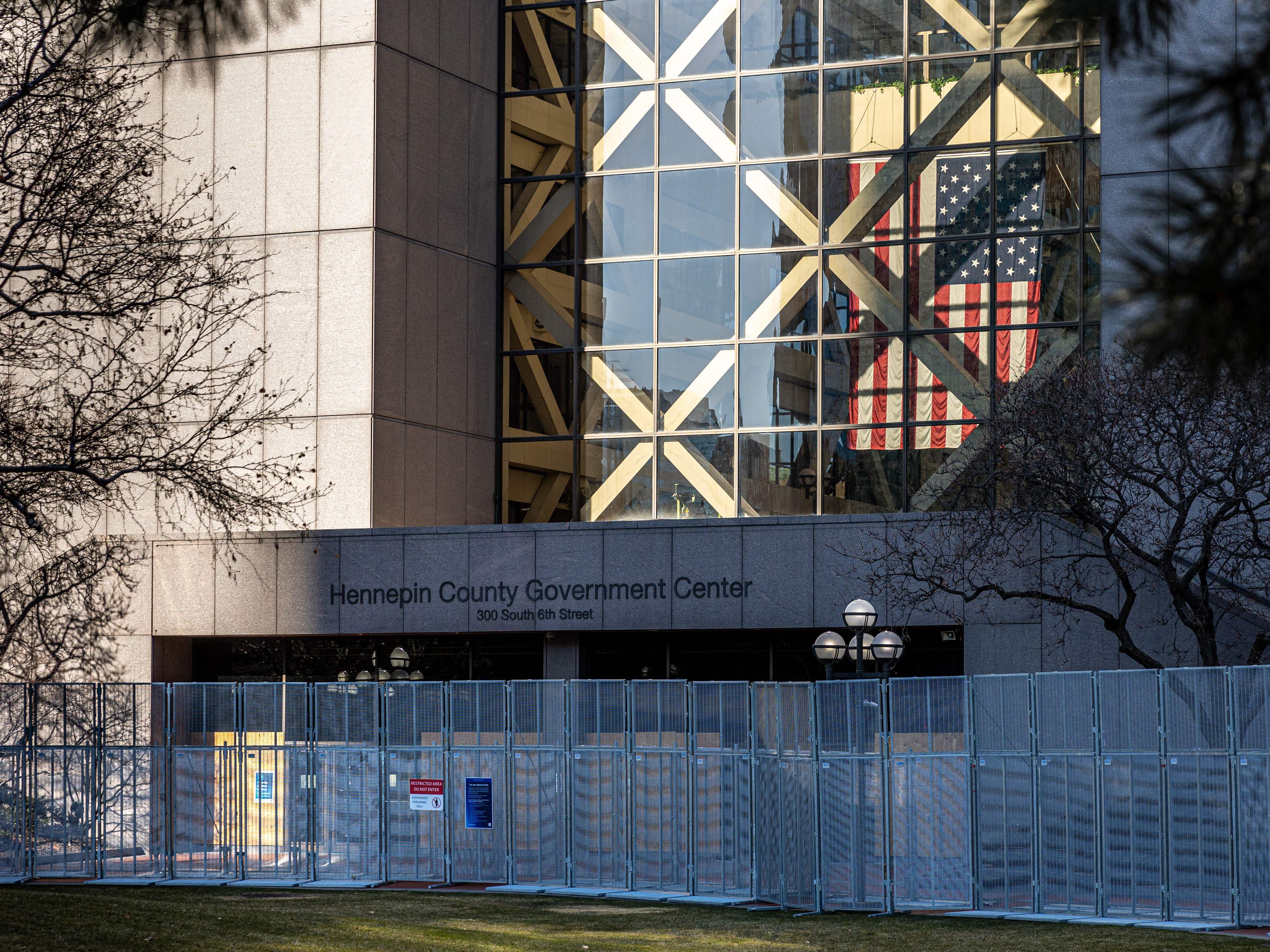 The Hennepin County Government Center is pictured on the third day of jury selection in the trial of former Minneapolis police officer Derek Chauvin on March 11. The prosecution and defense made their opening arguments on Monday morning. Kerem Yucel/AFP via Getty Images