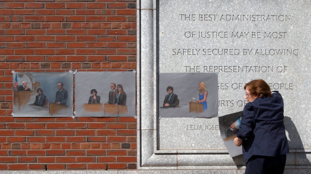The U.S. Supreme Court will review a lower court's decision from last summer that vacated the six death sentences imposed on Boston Marathon bomber Dzhokhar Tsarnaev. Here, artist Jane Flavell Collins pulls down her courtroom sketches outside the Moakley U.S. Courthouse in Boston after Tsarnaev was sentenced. John Blanding/Boston Globe via Getty Images
