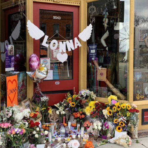 A makeshift memorial in front of a downtown Boulder store that shooting victims Tralona Bartkowiak co-owned with her sister. CREDIT: Kirk Siegler /NPR
