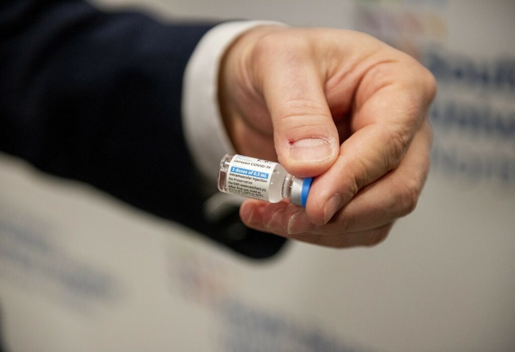 A health care worker holds a vial of the Johnson & Johnson COVID-19 vaccine at South Shore University Hospital in Bay Shore, N.Y., on Wednesday. CREDIT: via Getty Images