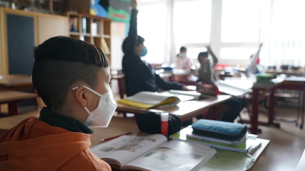 Moderna is testing its COVID-19 vaccine in young children; its vaccine is currently authorized for people ages 18 and up. Here, third-grade children attend school this month in Berlin, as classes were allowed to meet in person at 50% capacity. CREDIT: Sean Gallup/Getty Images