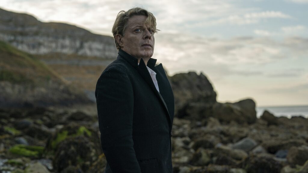 Eddie Izzard co-wrote the script for Six Minutes to Midnight, and stars as half German, half British teacher Thomas Miller. Courtesy of IFC Films