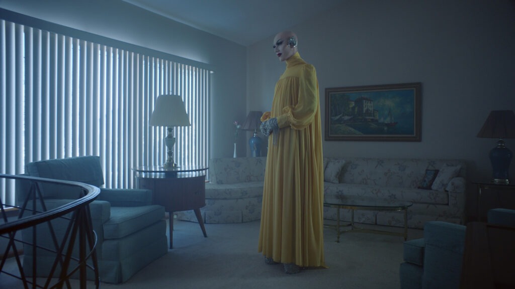 Sasha Velour stars in The Island We Made, an opera composed by Angélica Negrón and filmed in a mid-century Staten Island house. CREDIT: Matthew Placek/Courtesy of the artist