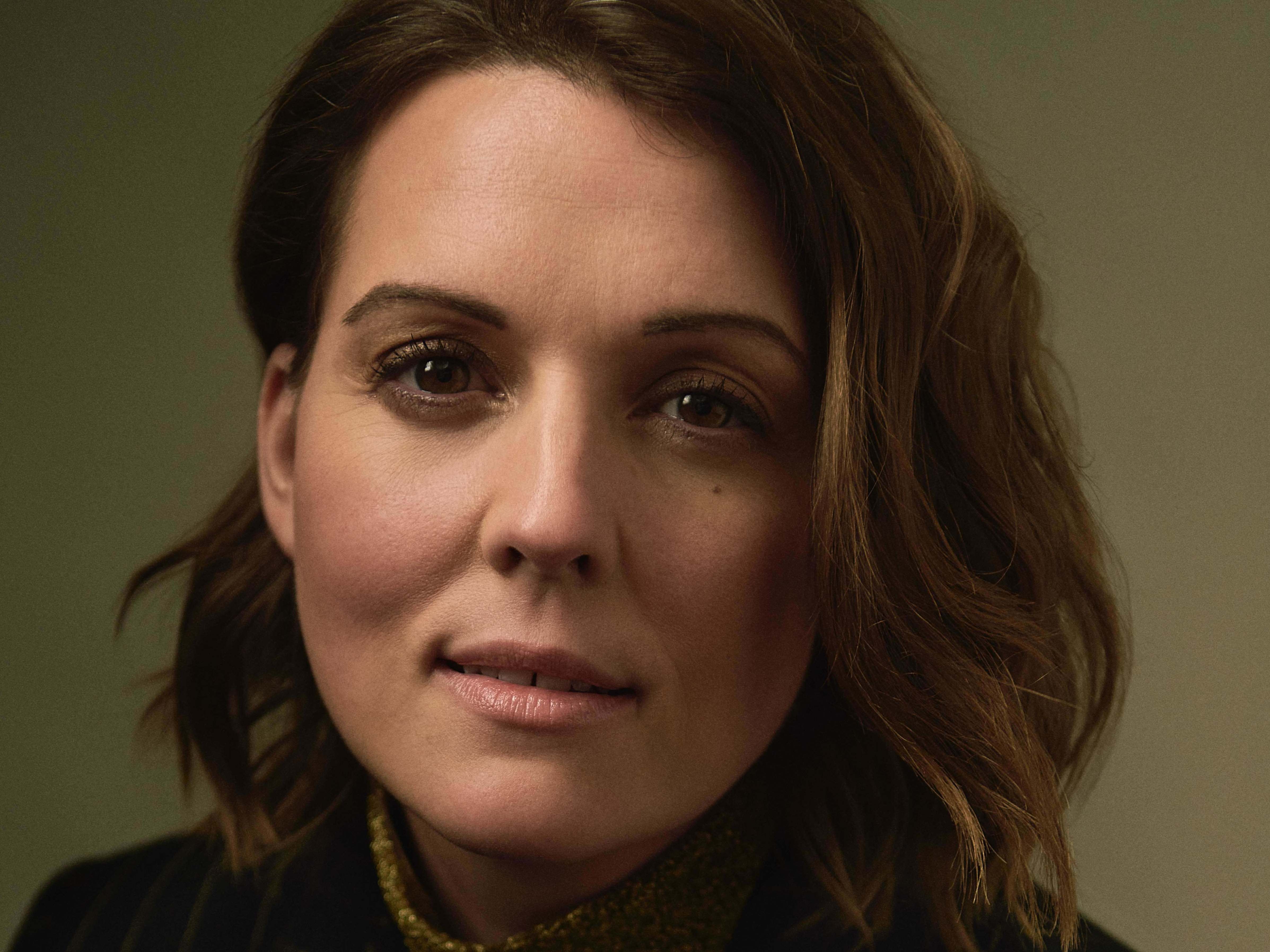 "Queer people love country music," singer-songwriter Brandi Carlile says. "... We just don't think that it's going to open its doors to us. And when it does, it's wildly satisfying." Austin Hargrave/AUGUST