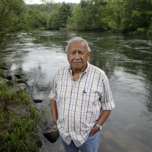 Billy Frank Jr. poses at Frank's Landing on the Nisqually River near Olympia on June 29, 2012. CREDIT: Ted. S. Warren/AP