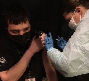 Staff administer a COVID-19 vaccine shot at the Wildhorse Casino, April 12, 2021 at a mass vaccination site managed by the Confederated Tribes of the Umatilla Reservation and Oregon National Guard. Courtesy of Jane Hill/CTUIR