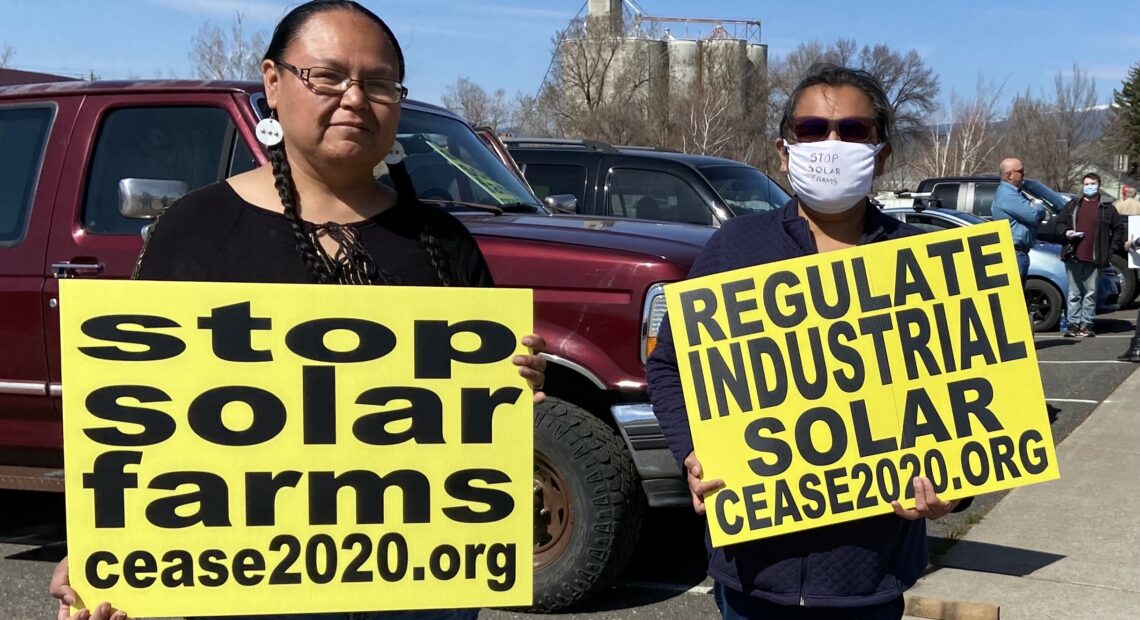 Elaine Harvey, left, a member of the Rock Creek band, Ka-milt-pah, of the Yakama Nation, at an April 1, 2021 demonstration in Goldendale opposing a solar farm project. CREDIT: Courtney Flatt/NWPB