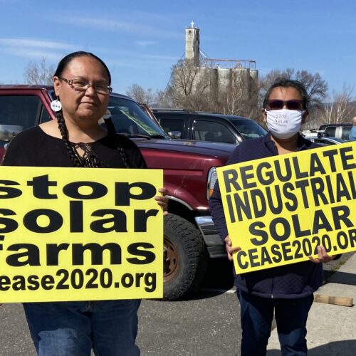 Elaine Harvey, left, a member of the Rock Creek band, Ka-milt-pah, of the Yakama Nation, at an April 1, 2021 demonstration in Goldendale opposing a solar farm project. CREDIT: Courtney Flatt/NWPB