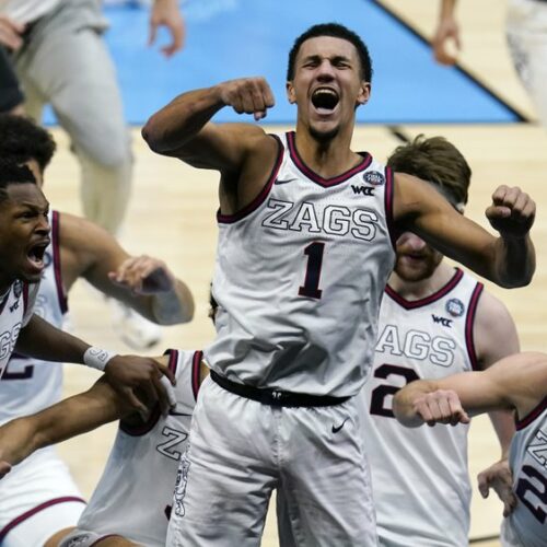 Gonzaga guard Jalen Suggs (1) celebrates making the game winning basket against UCLA during overtime in a men's Final Four NCAA college basketball tournament semifinal game, April 3, 2021, at Lucas Oil Stadium in Indianapolis. Gonzaga won 93-90 in overtime. CREDIT: Michael Conroy/AP