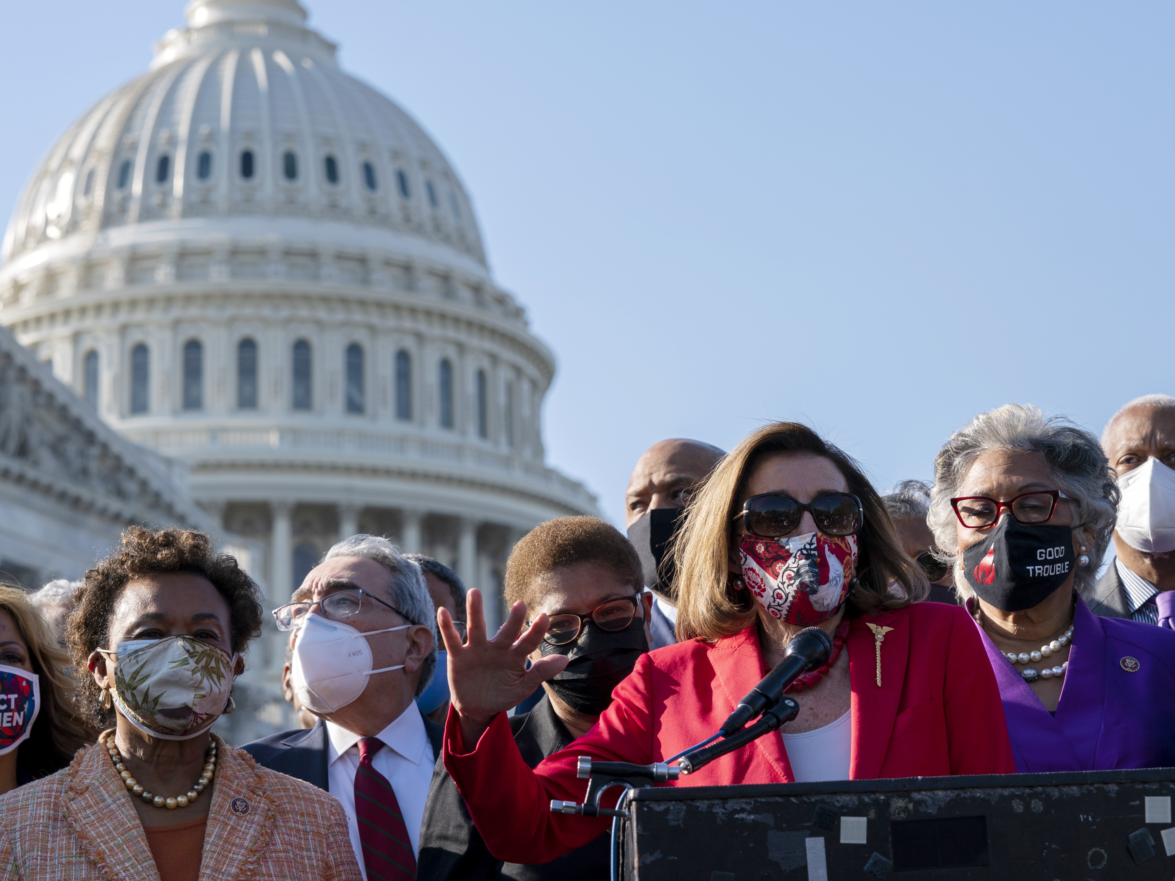 House Speaker Nancy Pelosi speaks alongside members of the Congressional Black Caucus on Tuesday following the verdict against former Minneapolis police officer Derek Chauvin for the murder of George Floyd. Jose Luis Magana/AP