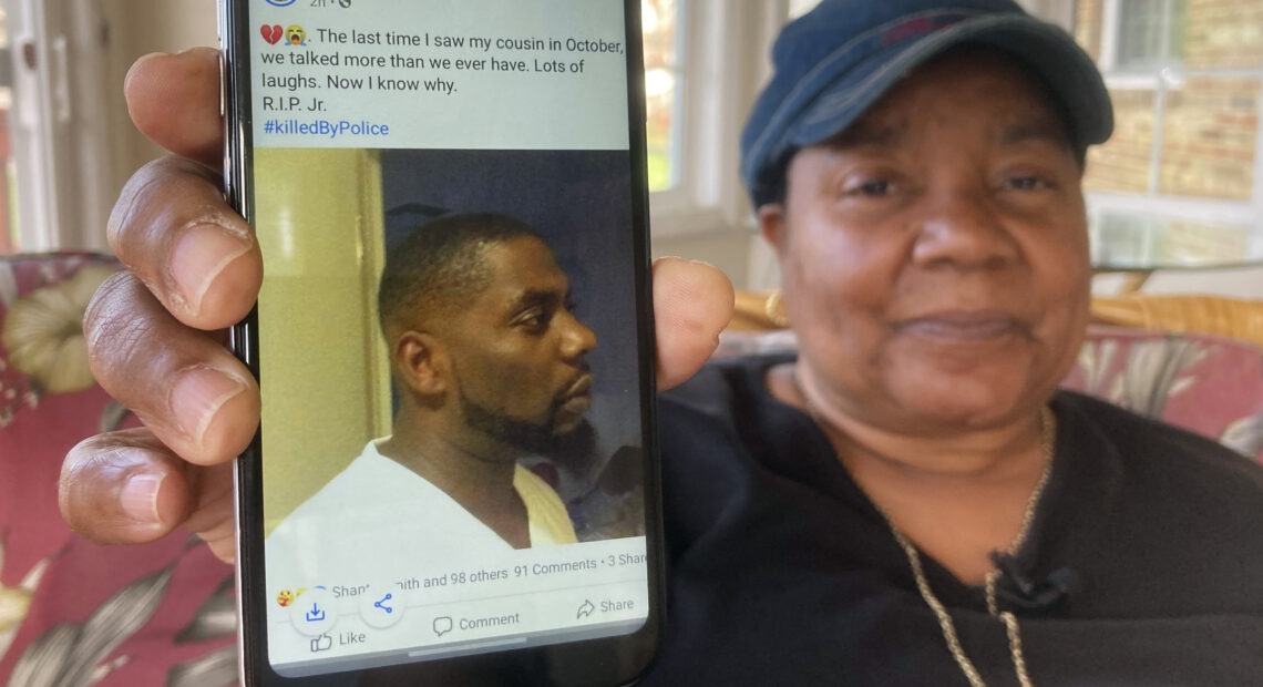 Andrew Brown Jr. was shot in the back of his head, his family's attorneys said Tuesday, citing an independent autopsy. Here, Glenda Brown Thomas displays a photo of Brown, her nephew, on her cellphone at her home in Elizabeth City, N.C. CREDIT: Allen G. Breed/AP