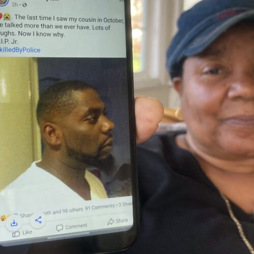 Andrew Brown Jr. was shot in the back of his head, his family's attorneys said Tuesday, citing an independent autopsy. Here, Glenda Brown Thomas displays a photo of Brown, her nephew, on her cellphone at her home in Elizabeth City, N.C. CREDIT: Allen G. Breed/AP