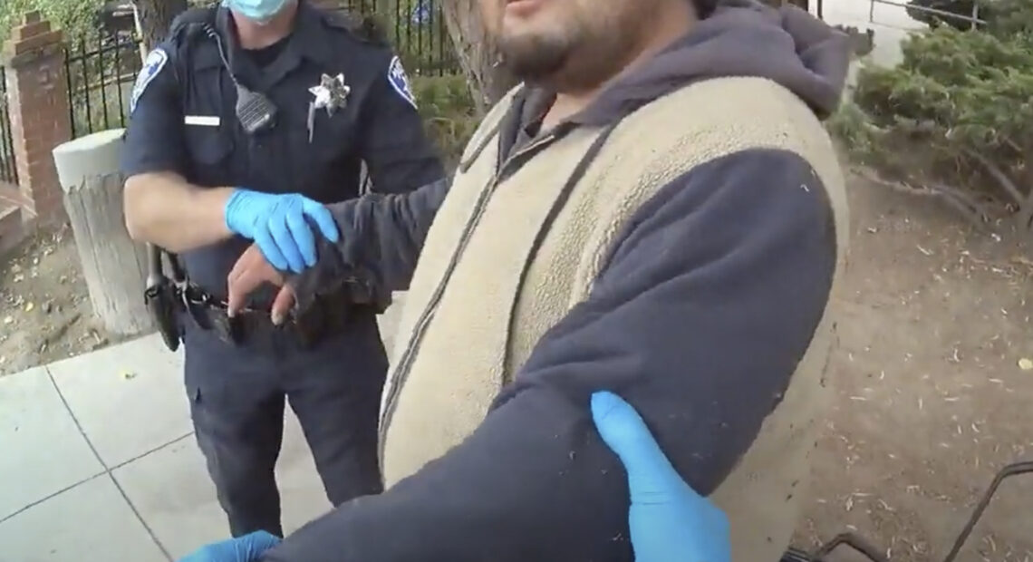 A screenshot of the Alameda Police Department body camera footage shows officers detaining Mario Gonzalez, 26, on April 19. Gonzalez died soon after. CREDIT: Alameda Police Department via AP