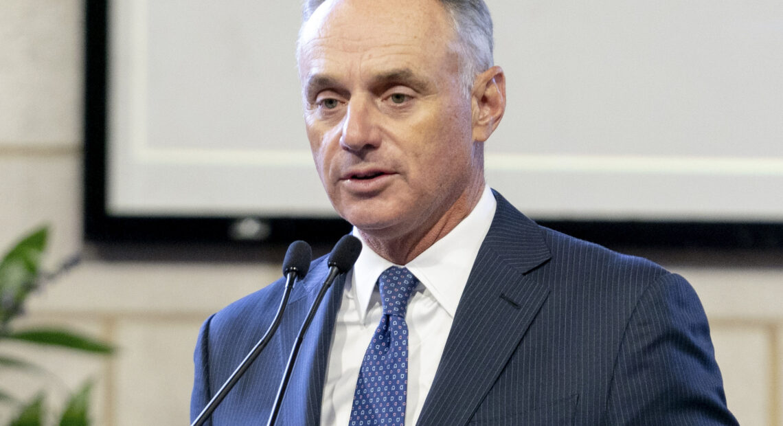 Major League Baseball Commissioner Rob Manfred, pictured in January, on Friday said the organization unwaveringly supports "fair access to voting." Kevin D. Liles/AP