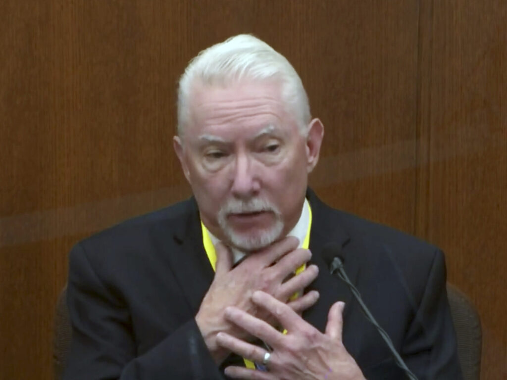 Barry Brodd, a use-of-force expert, testifies Tuesday in former Minneapolis police officer Derek Chauvin's trial. Brodd said the position in which George Floyd was restrained — facedown on the ground — was safest for officers and the suspect. CREDIT: Court TV/Pool via AP