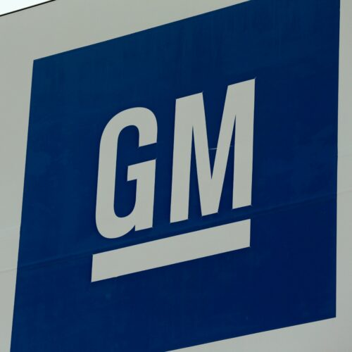 A sign is seen outside of a General Motors plant in Detroit, on Jan. 27, 2020. GM said on Thursday it is idling more plants as it continues to deal with a shortage of chips. CREDIT: Jeff Kowalsky/AFP via Getty Images