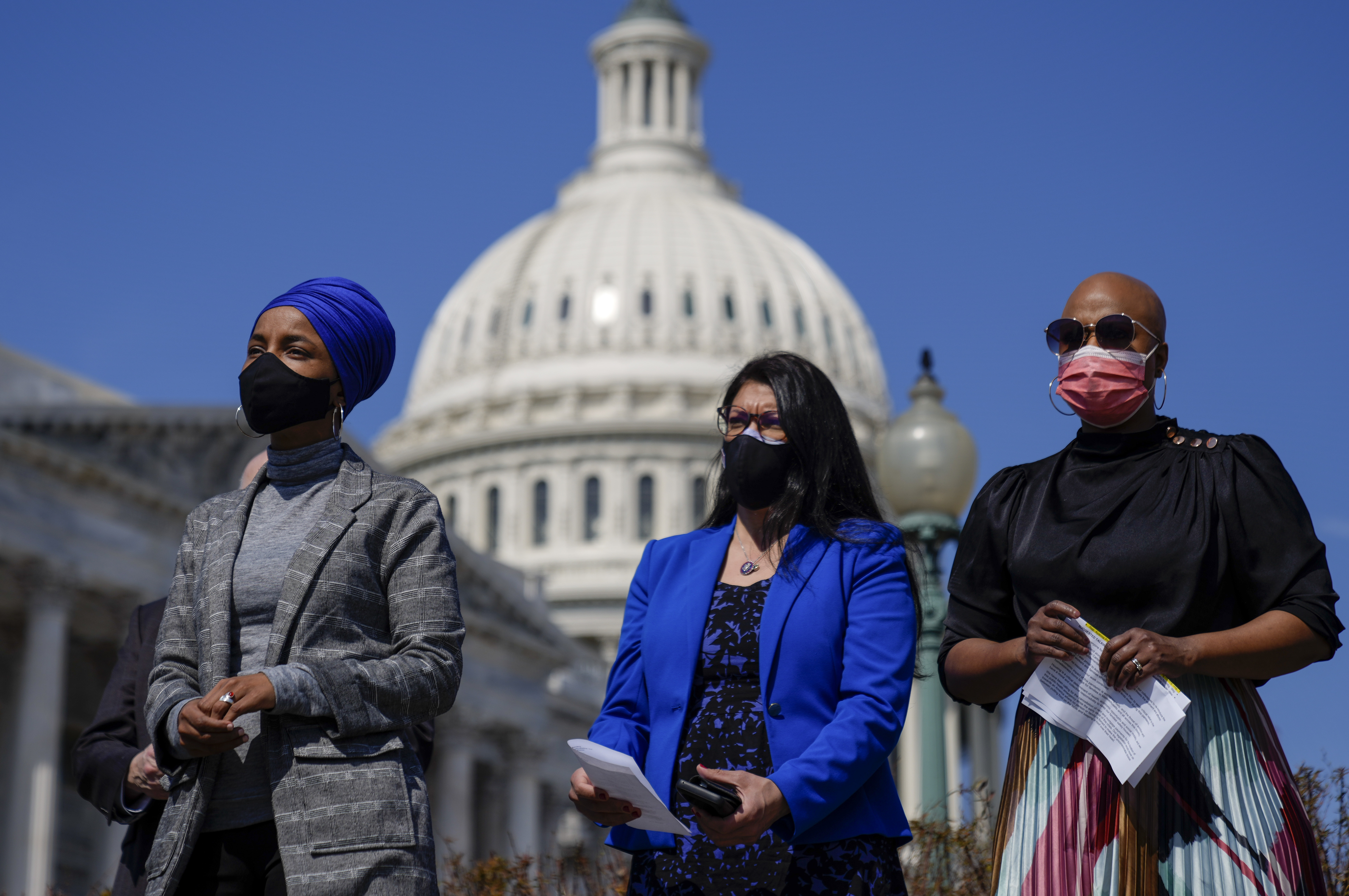 Reps. Ilhan Omar (from left), Rashida Tlaib and Ayanna Pressley, seen here at a news conference last month outside the U.S. Capitol, are among those calling on the Biden administration to lift the cap on refugees. Drew Angerer/Getty Images