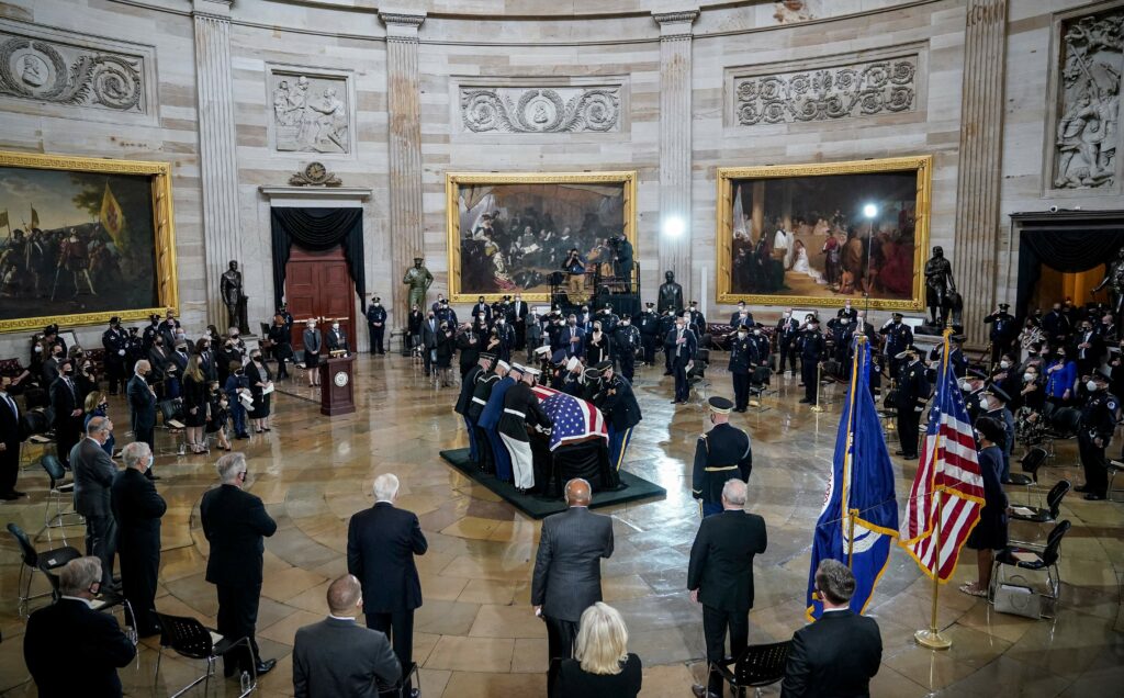 The casket of the late U.S. Capitol Police officer William "Billy" Evans arrives for a memorial service in the Rotunda at the U.S. Capitol on Tuesday. CREDIT: Drew Angerer/Pool/AFP via Getty Images
