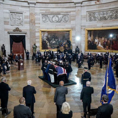 The casket of the late U.S. Capitol Police officer William "Billy" Evans arrives for a memorial service in the Rotunda at the U.S. Capitol on Tuesday. CREDIT: Drew Angerer/Pool/AFP via Getty Images