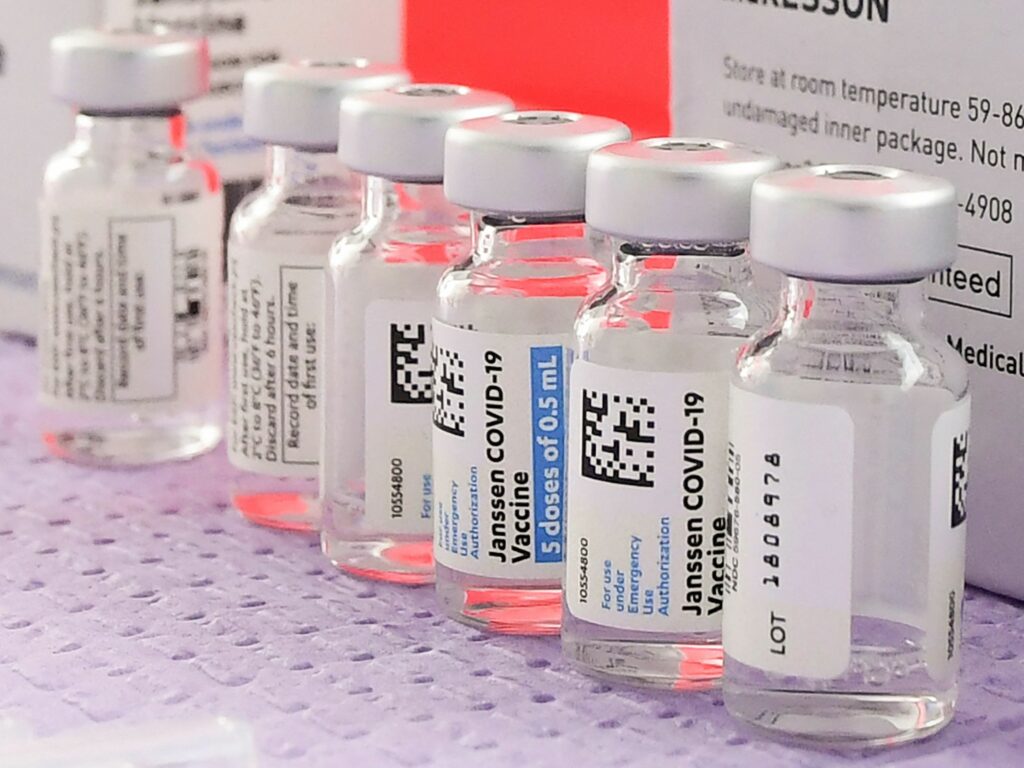 Bottles of the single-dose Johnson & Johnson COVID-19 vaccine await transfer into syringes for administering last month in Los Angeles. CREDIT: Frederic J. Brown/AFP via Getty Images