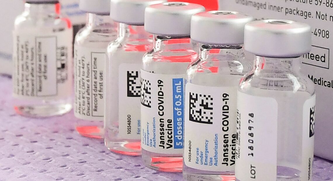 Bottles of the single-dose Johnson & Johnson COVID-19 vaccine await transfer into syringes for administering last month in Los Angeles. CREDIT: Frederic J. Brown/AFP via Getty Images