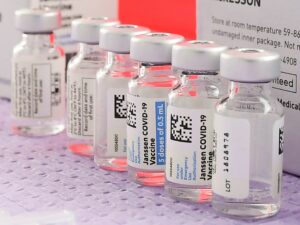 Bottles of the single-dose Johnson & Johnson COVID-19 vaccine await transfer into syringes for administering last month in Los Angeles. CREDIT: Frederic J. Brown/AFP via Getty Images
