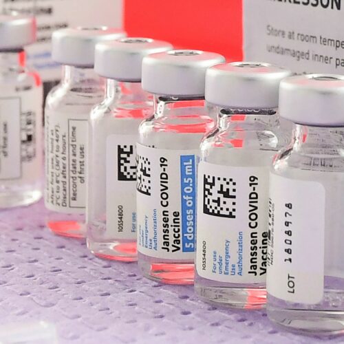 Bottles of the single-dose Johnson & Johnson COVID-19 vaccine await transfer into syringes for administering last month in Los Angeles. CREDIT: Frederic J. Brown/AFP via Getty Images