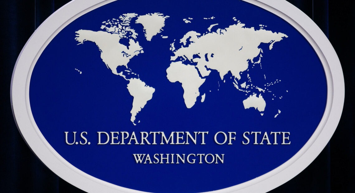 U.S. State Department logo and podium