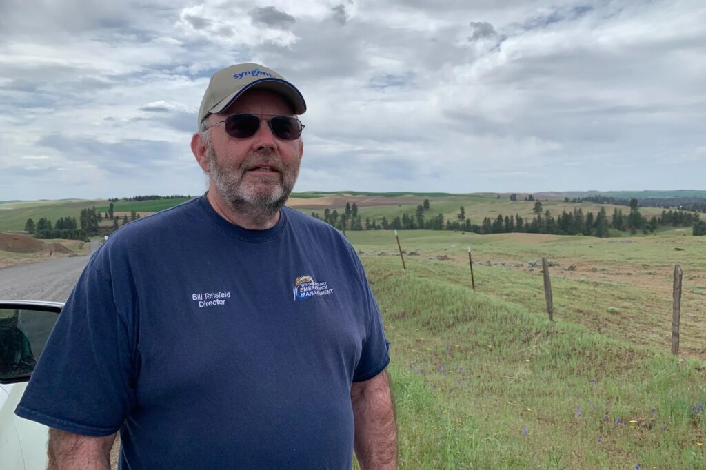 Bill Tensfeld, director of emergency management for Whitman County, says the destructive wildfires last year should be an 'eye opener' for the rest of eastern Washington this summer. Kirk Siegler/NPR