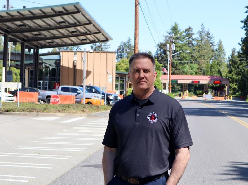 Chief Christopher Carleton of Whatcom County Fire District 5 proposes to open a drive-thru vaccination site on the U.S. side of the Point Roberts border crossing. CREDIT: Tom Banse/N3
