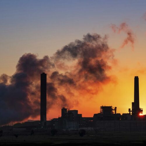 In this July 27, 2018, the Dave Johnson coal-fired power plant is silhouetted against the morning sun in Glenrock, Wyo. A law signed April 6, 2021, by Republican Gov. Mark Gordon creates a $1.2 million fund for an initiative that marks the latest attempt by state leaders to help coal in the state that accounts for the bulk of U.S. coal production, which is down by half since 2008. Wyoming coal production, which accounts for about 40% of the nation's total, has declined as utilities switch to gas, which is cheaper to burn to generate electricity. CREDIT: J. David Ake/AP