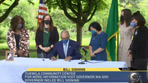 Gov. Jay Inslee on May 4, 2021, signed into law a new capital gains tax and an expanded version of the state's Working Families Tax Exemption which has never before been funded. CREDIT: TVW/screenshot