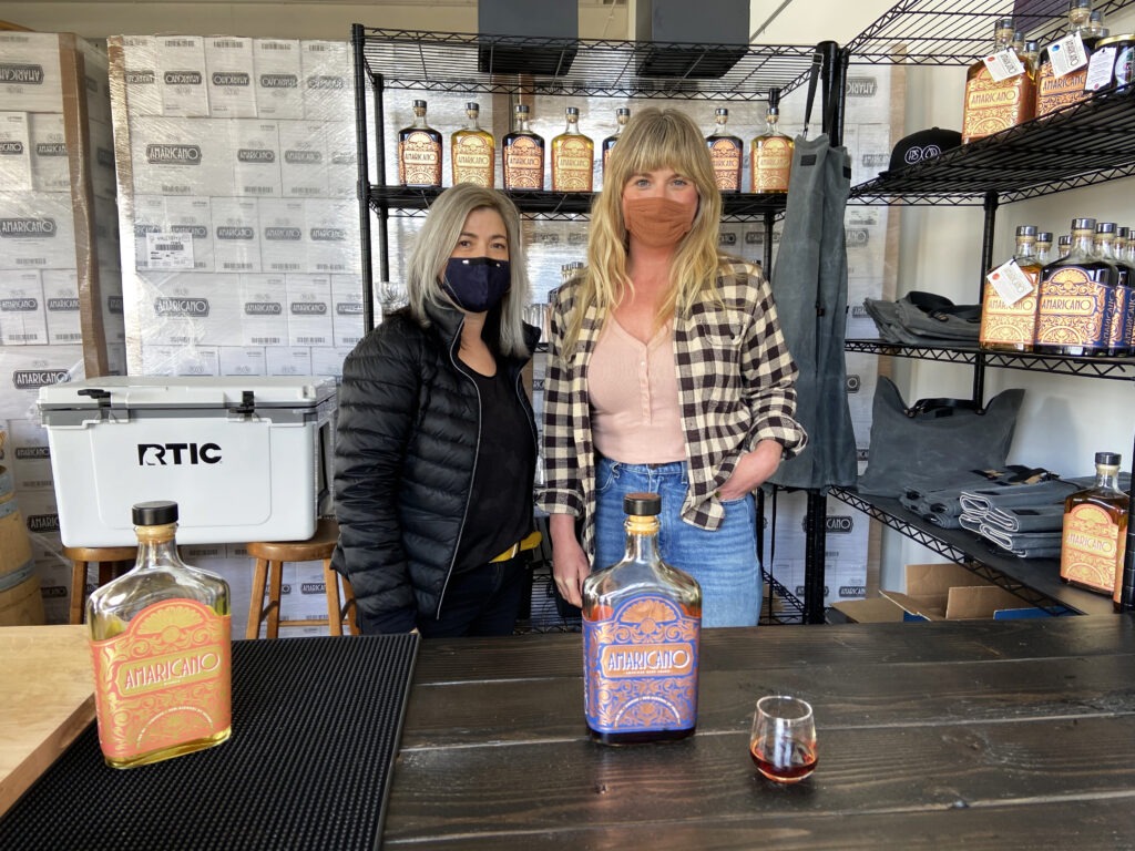 Jamie Hunt, left, and Holly Robinson opened Fast Penny Spirits during the pandemic. They use locally sourced ingredients, including Northwest truffles, in both styles of amaro liqueur they sell.