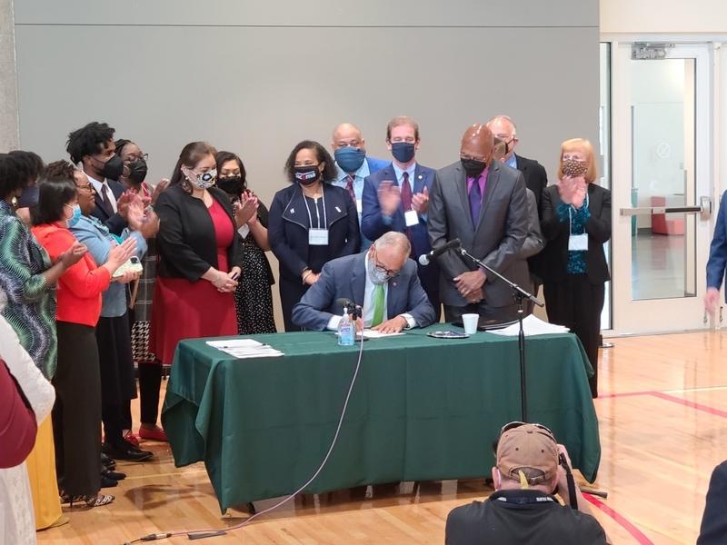 Gov. Jay Inslee signed into law a suite of police accountability bills Tuesday, May 18, 2021 at a bill signing ceremony in Tacoma. CREDIT: Kari Plog/KNKX